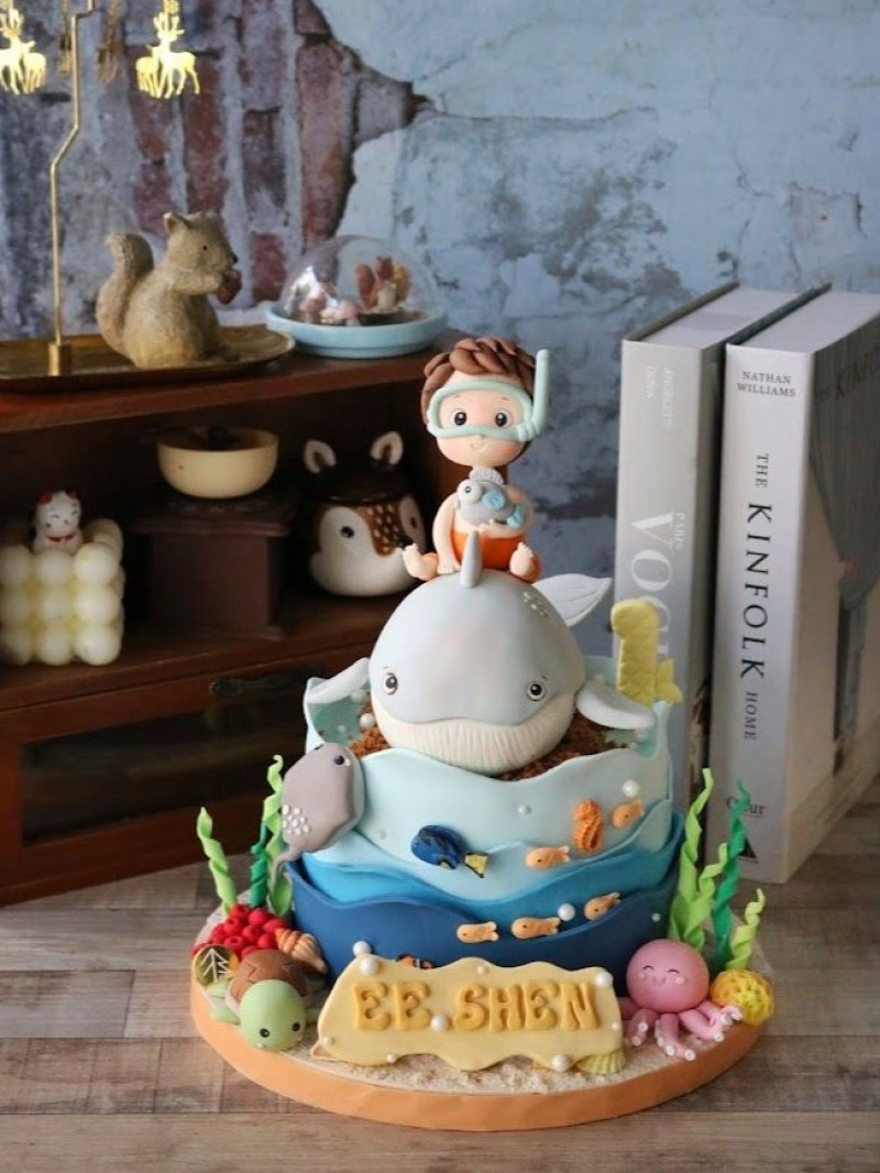 Baby on Whale Cake